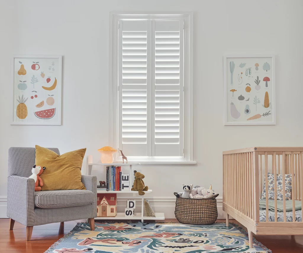Two Panel Shutter with cot in baby room